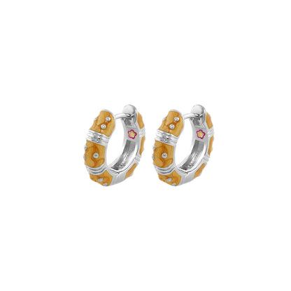 Polka Dot Wide Huggie Earrings by Lauren G Adams; yellow wood hoops with silver accents on Tampa Home & Garden Store