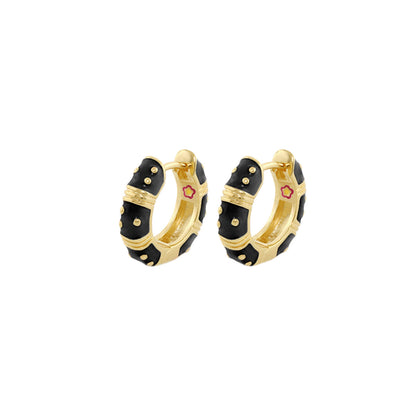 Polka Dot Wide Huggie Earrings pair by Lauren G Adams, gold-tone hoops with black enamel on Tampa Home & Garden Store