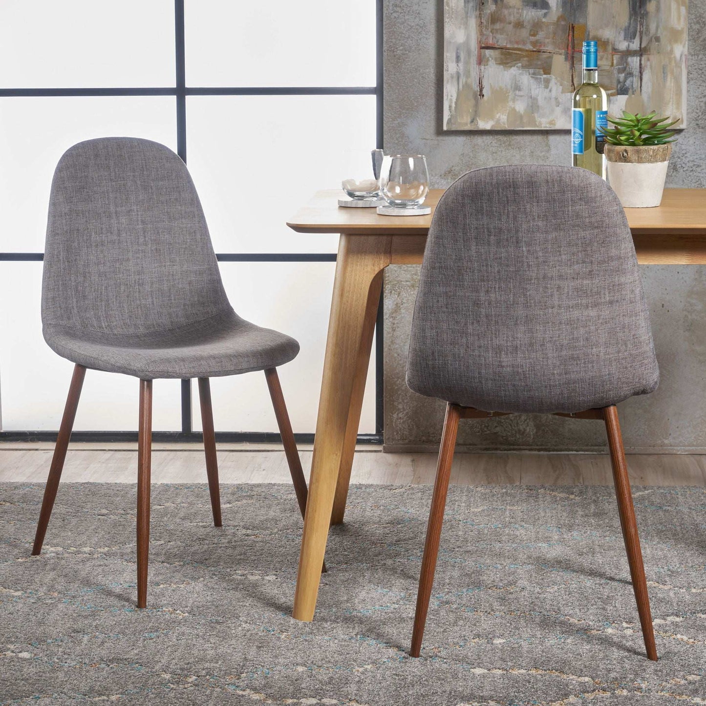 Modern minimalist fabric dining chair pair in grey upholstery with wooden legs on Tampa Home & Garden Store