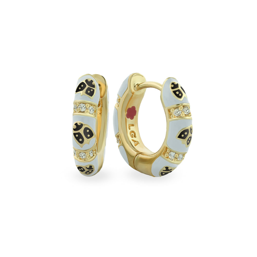 Lady Poof Earrings pair, Lauren G Adams gold-tone hoops with white enamel and crystals, on Tampa Home & Garden Store