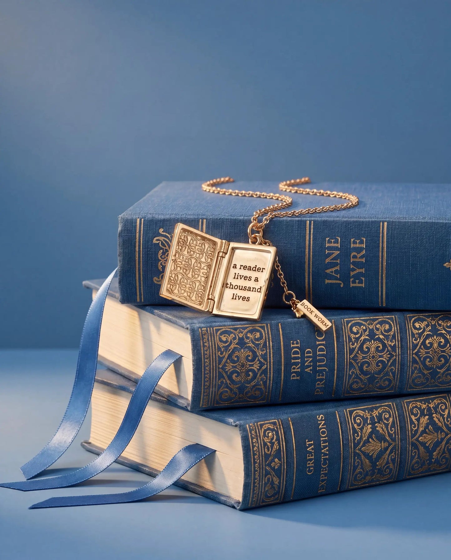 A Reader Lives A Thousand Lives Book Club Locket Pendant, gold-tone necklace by ALEX AND ANI on Tampa Home & Garden Store