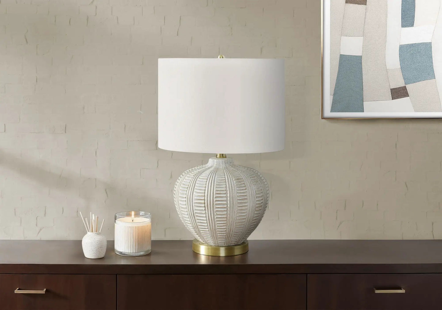 Table lamp cream shade with ribbed ceramic base on dark wood console on Tampa Home & Garden Store