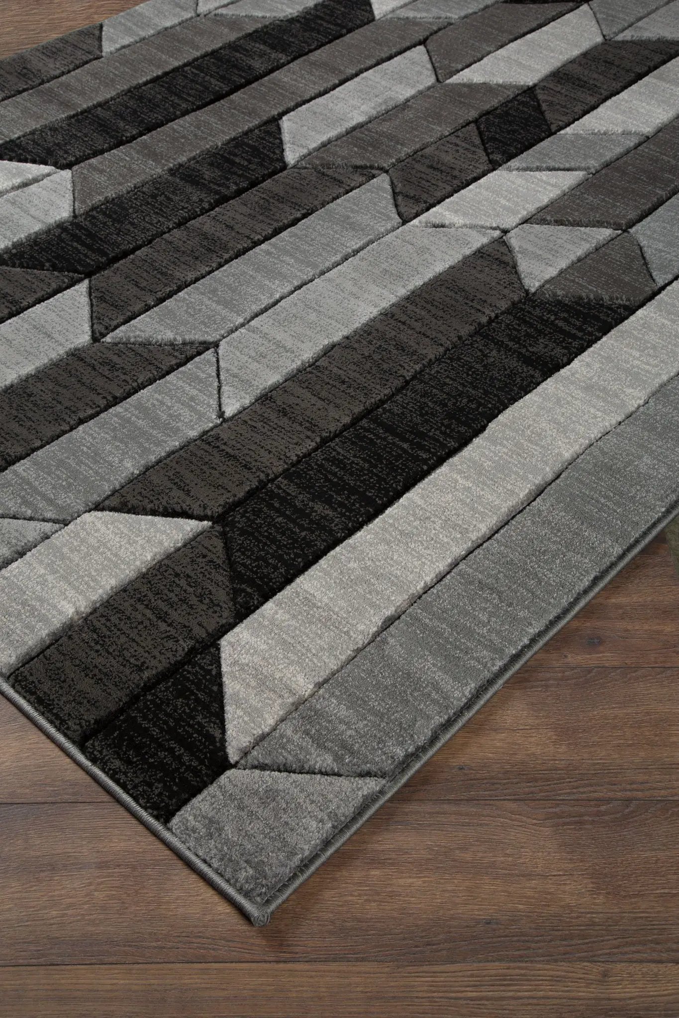Chayse rug by Unique Piece Furniture, grayscale geometric patchwork area rug on Tampa Home & Garden Store