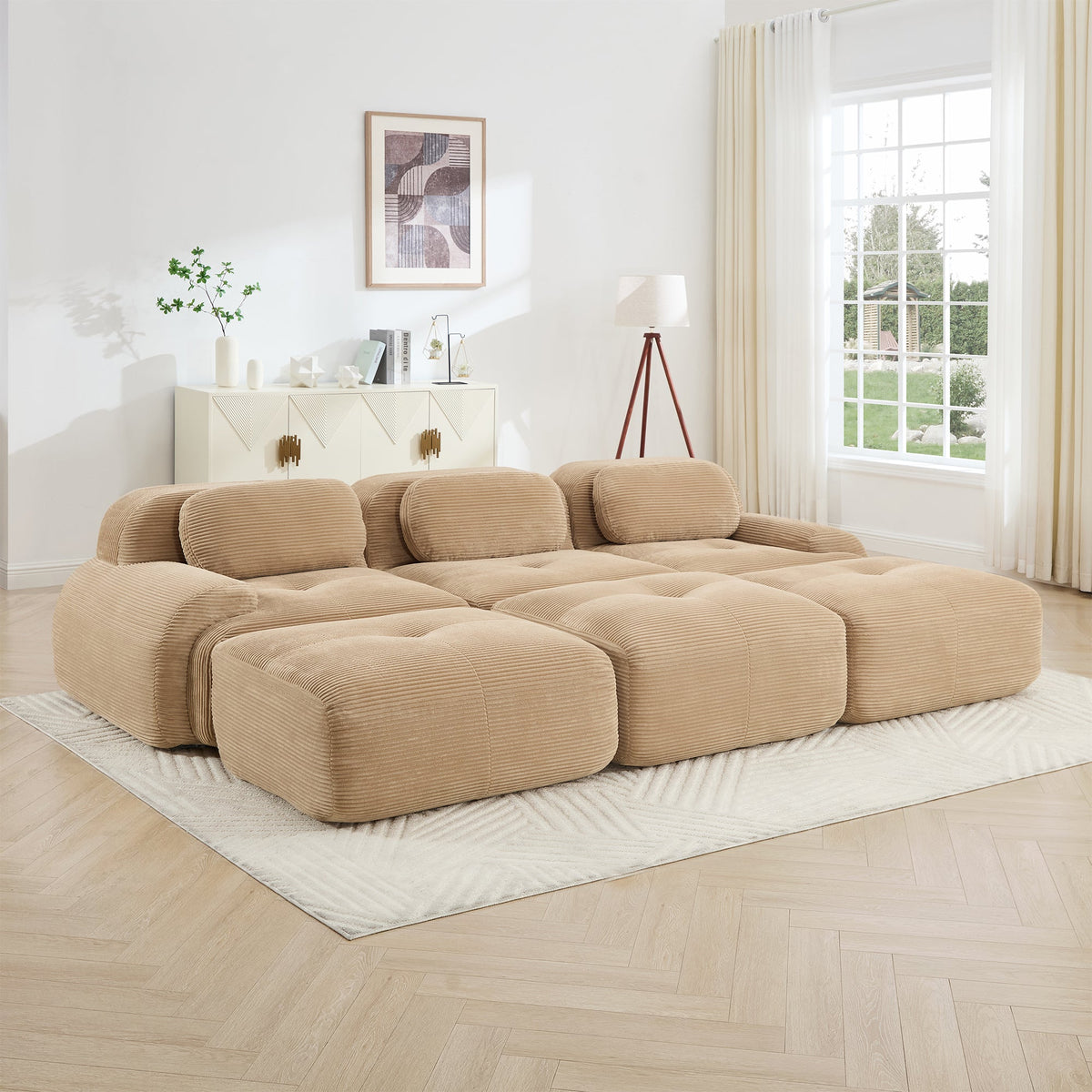 Camel ribbed-fabric three-seat modular sofa with 3 ottomans in a bright living room on Tampa Home & Garden Store
