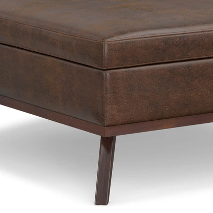 Owen square coffee table storage ottoman in distressed brown leather with stitched edges on Tampa Home & Garden Store