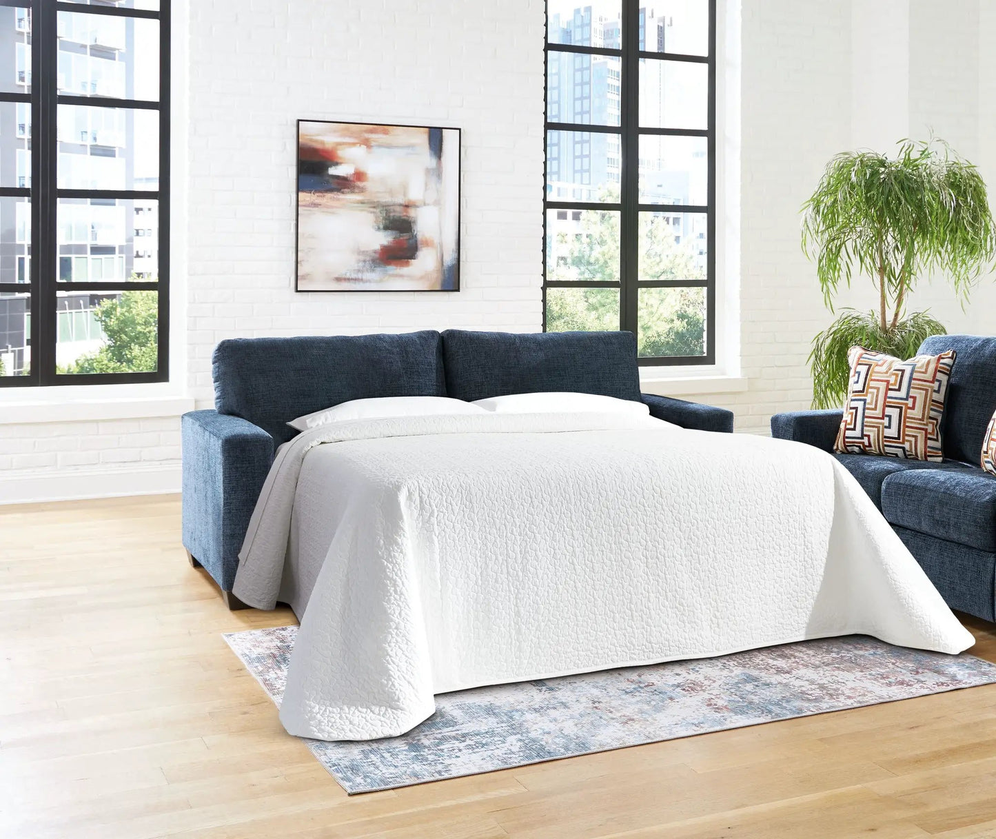 Aviemore sofa sleeper by Unique Piece Furniture in blue fabric upholstery on Tampa Home & Garden Store