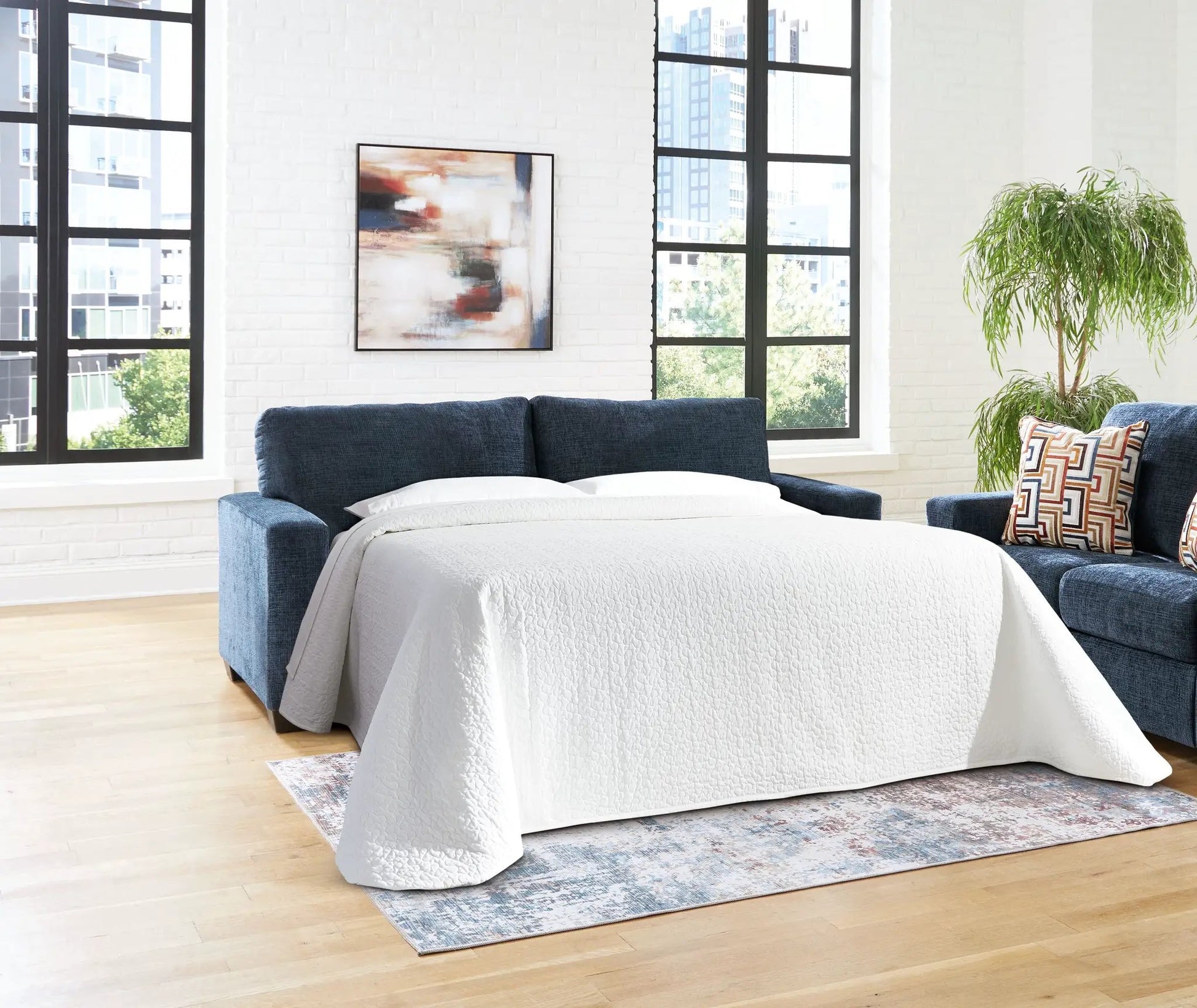 Aviemore sofa sleeper by Unique Piece Furniture in blue fabric upholstery on Tampa Home & Garden Store