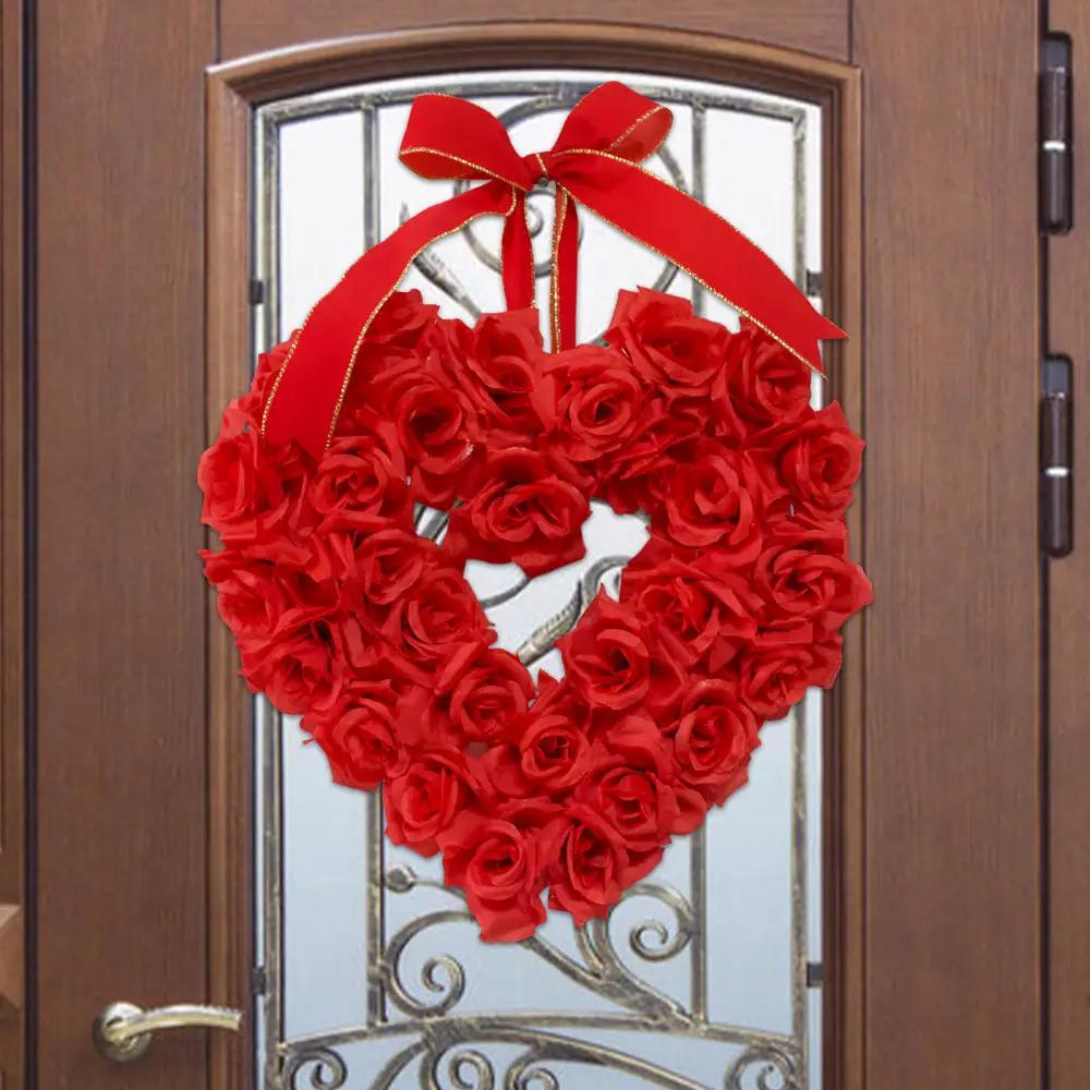 Red rose heart wreath with ribbon bow for weddings and Valentines decor hanging on a front door on Tampa Home & Garden Store