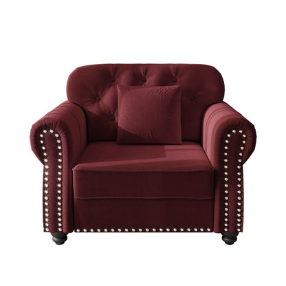 Sofa with nailhead trim and rolled armrests