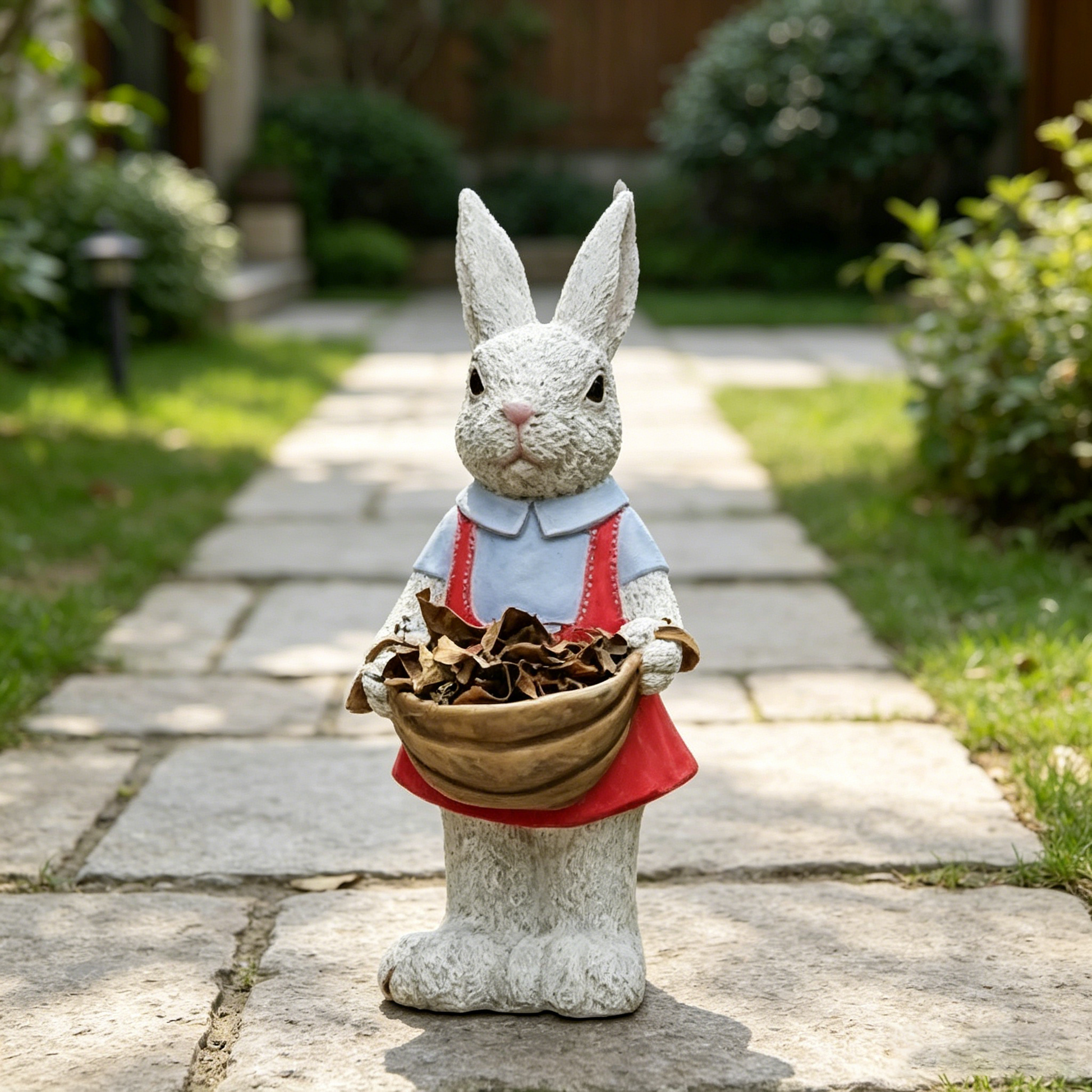 Charming hand-painted rabbit garden statue with a leaf basket, stone-like finish by HouseOfZazla on Tampa Home & Garden Store