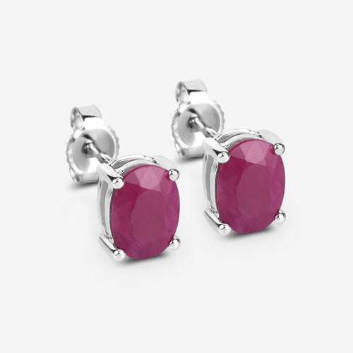 Pair of 1.70ct ruby stud earrings in 10K white gold with oval-cut stones on Tampa Home & Garden Store
