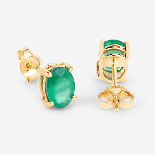 Emerald-green oval stud earrings in 10K yellow gold with butterfly backs on Tampa Home & Garden Store