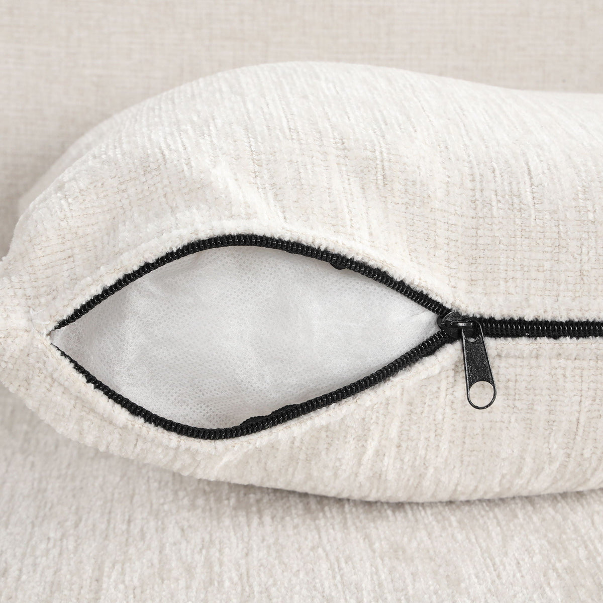 U-shaped sectional sofa cream fabric close-up with black zipper on Tampa Home & Garden Store