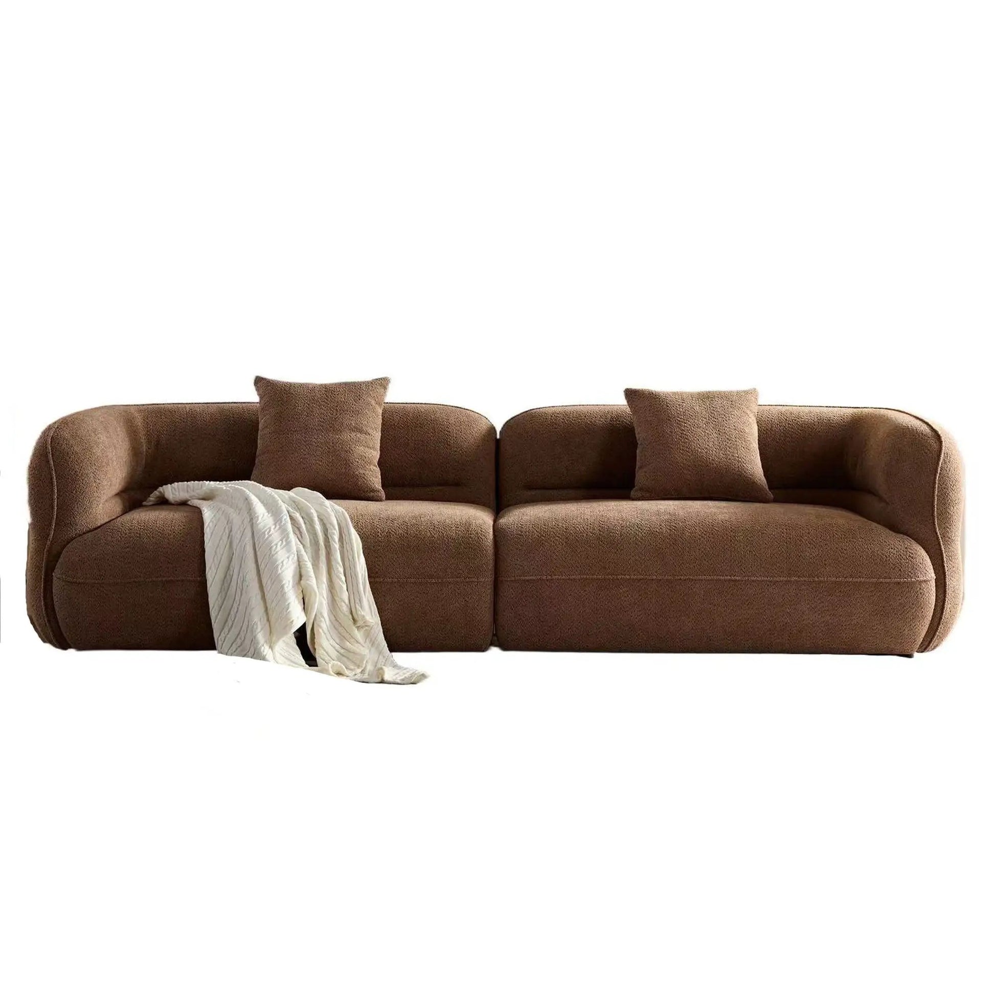 Brown fabric sectional sofa with two back cushions and a white throw on Tampa Home & Garden Store