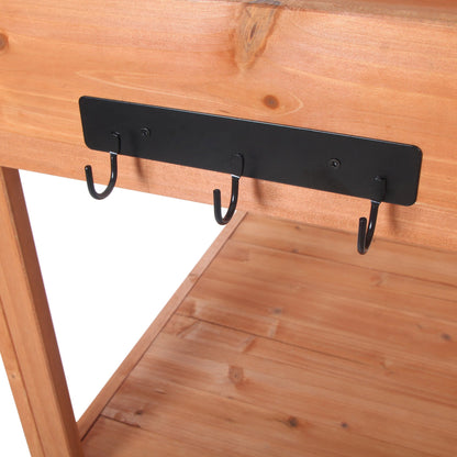Wooden farmhouse rustic potting bench back panel with black metal hooks on Tampa Home & Garden Store