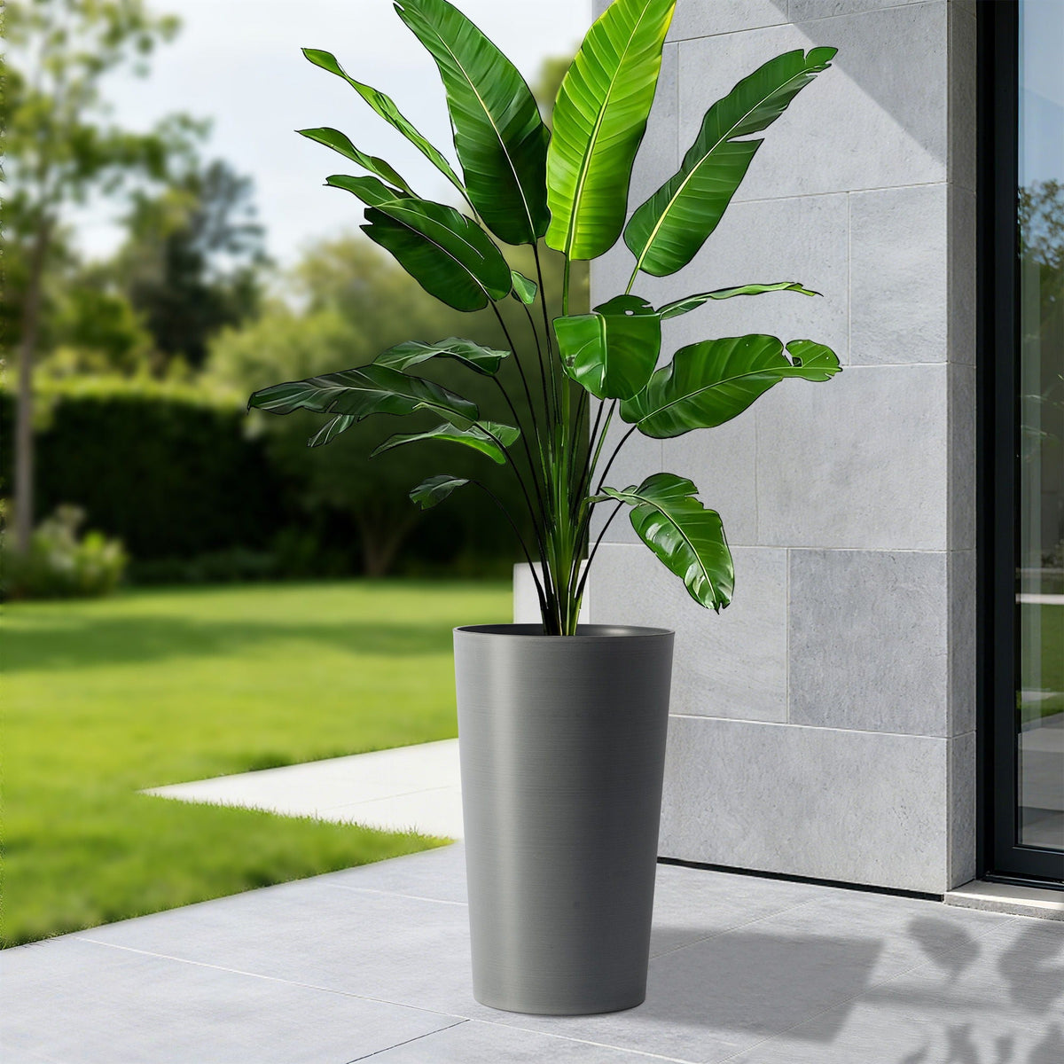 Planter For Outdoor gray planter with tall tropical plant and large green leaves HouseOfZazla on Tampa Home & Garden Store