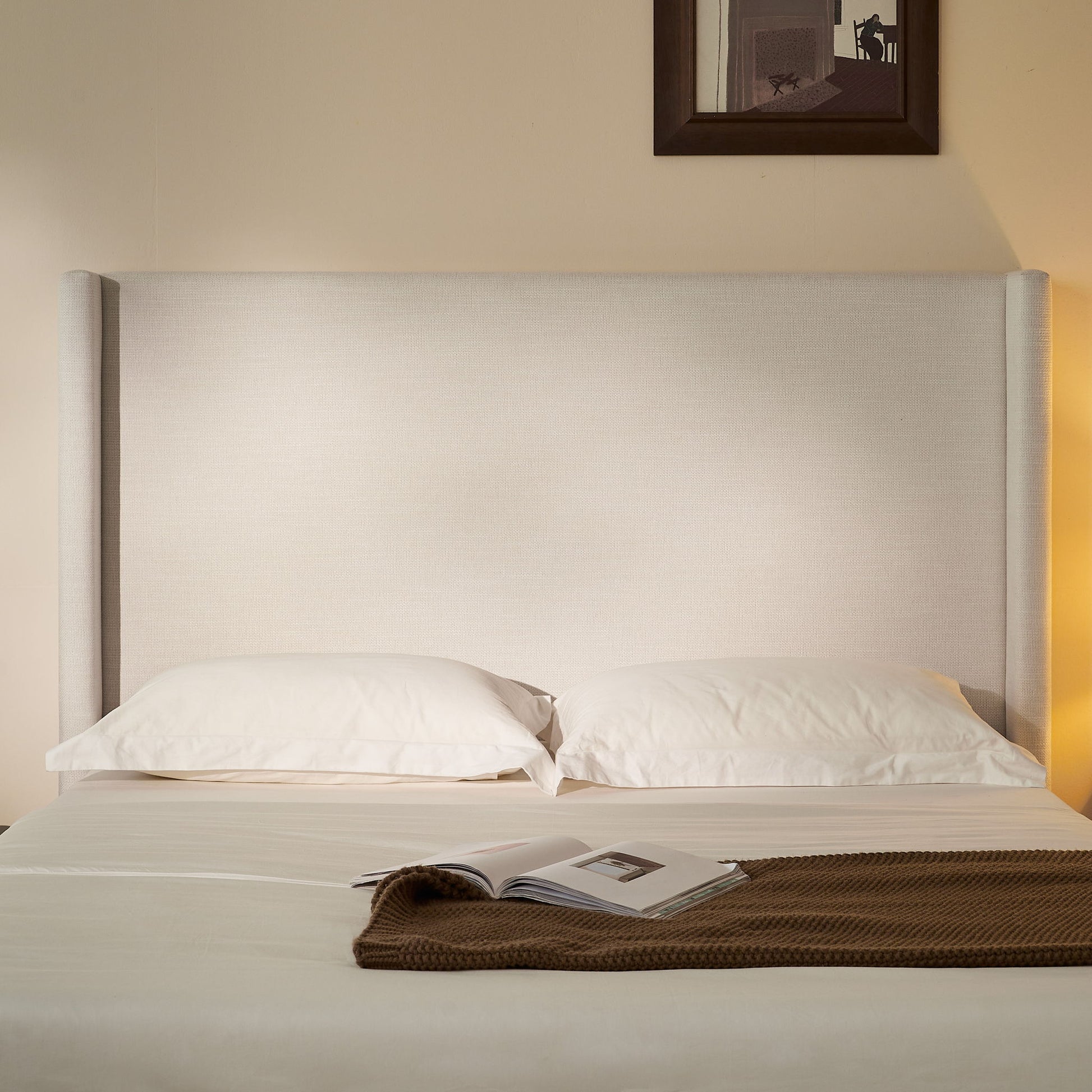 Hosford minimalist upholstered wingback bed in light beige fabric headboard on Tampa Home & Garden Store
