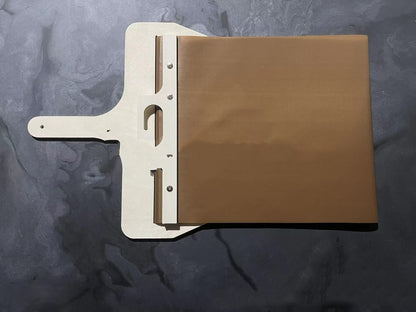 3-size sliding pizza peel with wooden handle and storage board, white frame and brown wood panel on Tampa Home & Garden Store