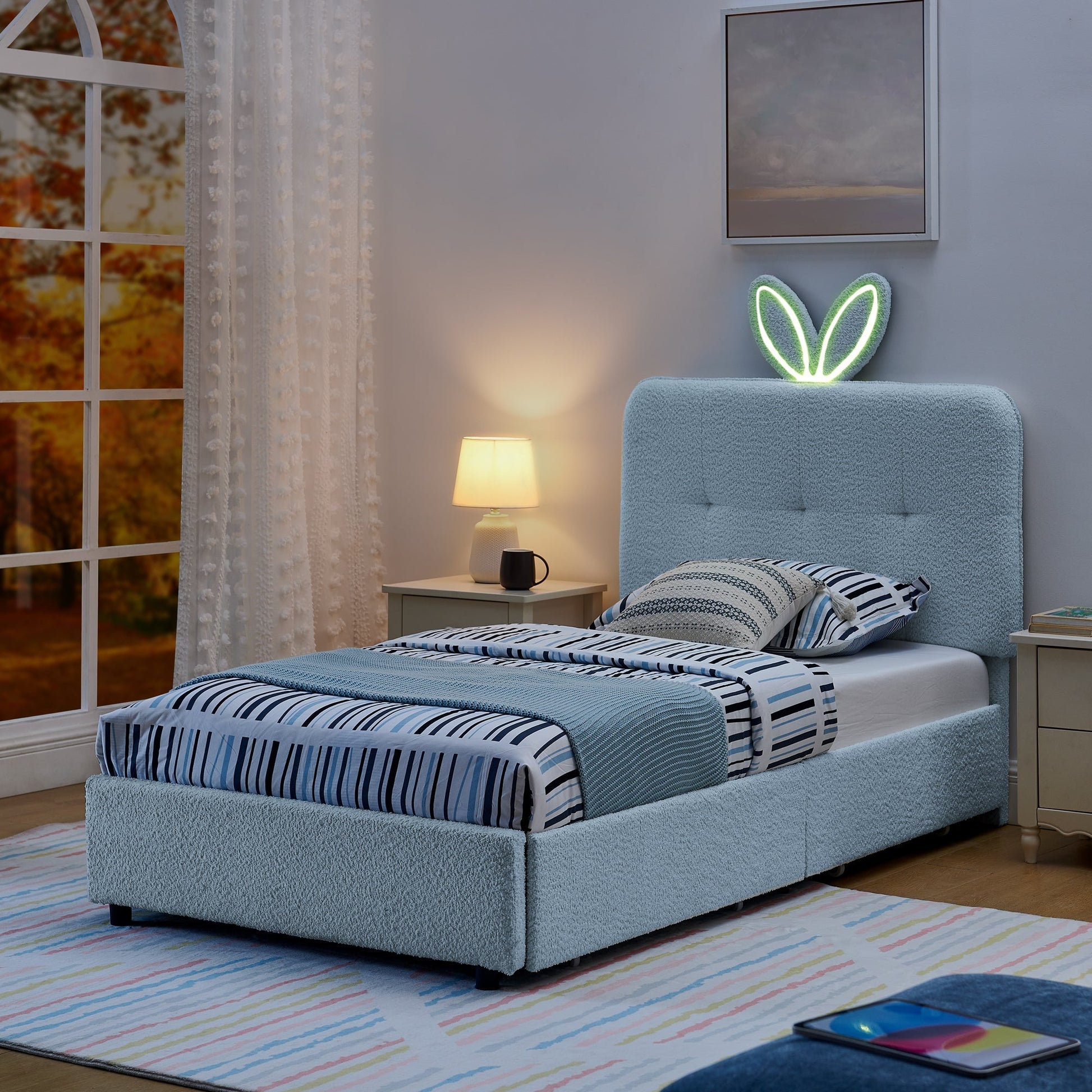 Twin Size Kids Upholstered Bed with Oversized Rabbit Ear Headboard in light blue fabric with neon ear decor on Tampa Home & Garden Store