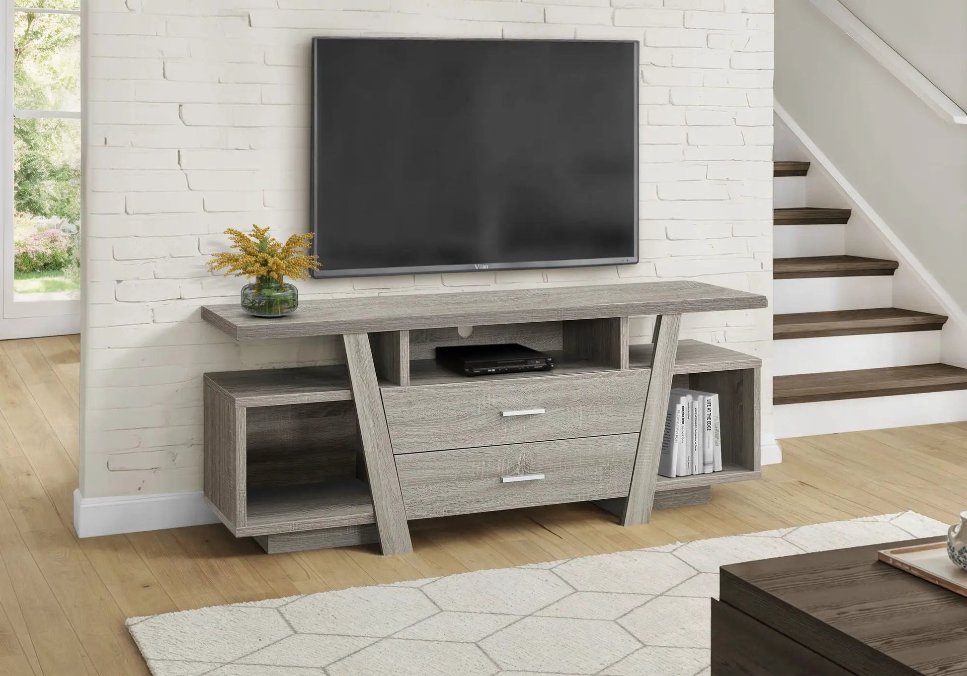 TV stand by Unique Piece Furniture in taupe wood finish with storage drawers and open shelf on Tampa Home & Garden Store