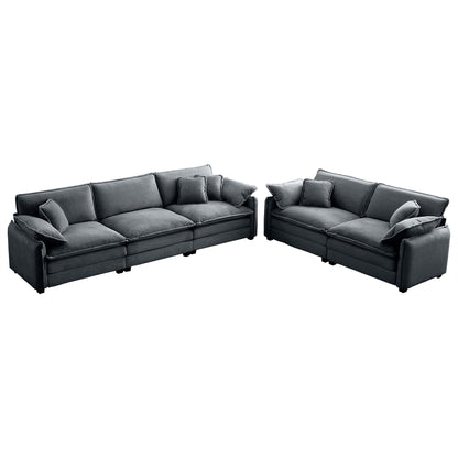Family sofa set featuring two dark gray striped deep-seat sectionals with plush cushions on Tampa Home & Garden Store