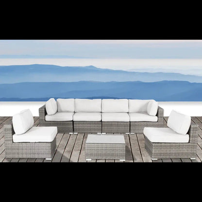 4-piece outdoor seating set with cushions in a wicker design on a wooden deck on Tampa Home & Garden Store