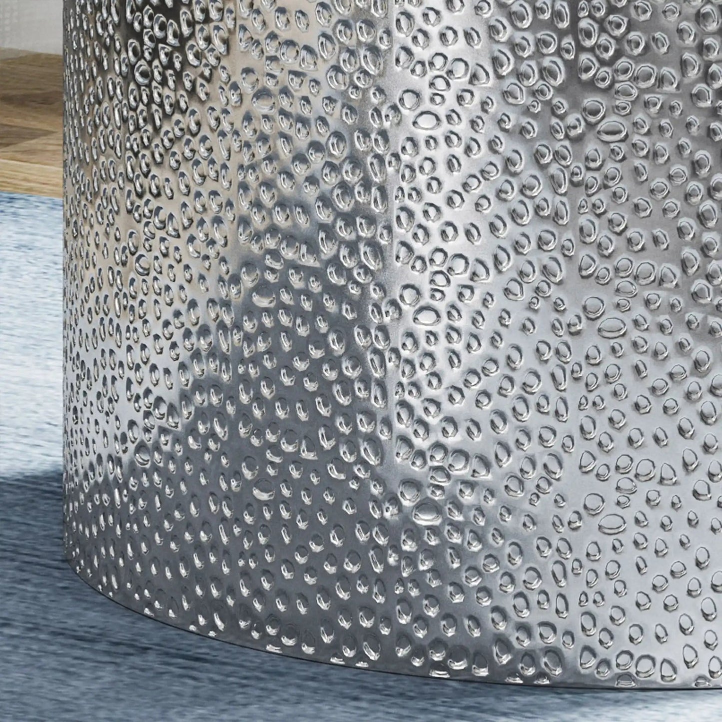 Modern round accent table by HouseOfZazla with hammered silver surface on Tampa Home & Garden Store
