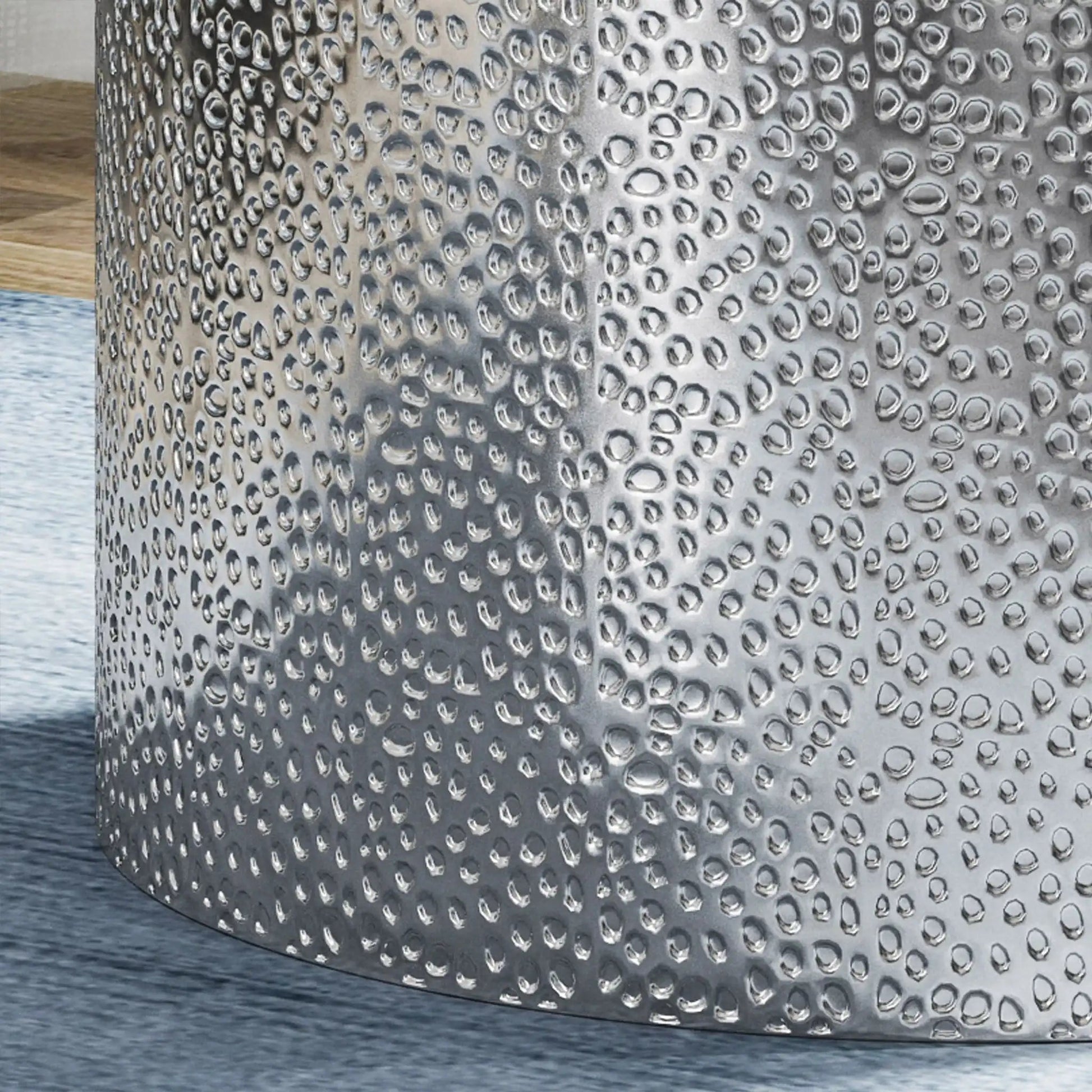 Modern round accent table by HouseOfZazla with hammered silver surface on Tampa Home & Garden Store