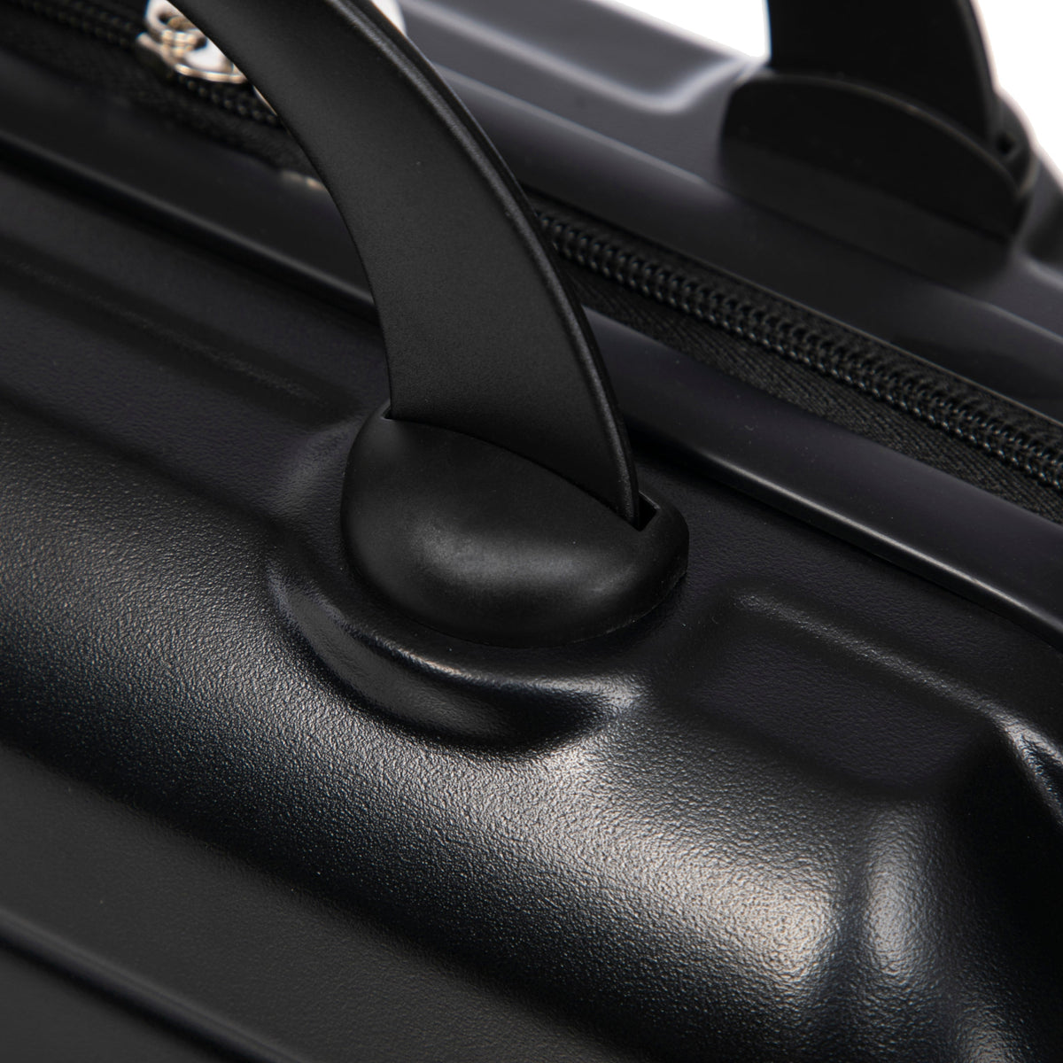 Luggage set HouseOfZazla in black ABS finish, closeup of handle and zipper detail on Tampa Home & Garden Store