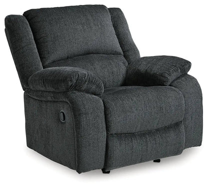 Draycoll Rocker Recliner in dark charcoal upholstery with plush cushions and side lever on Tampa Home & Garden Store
