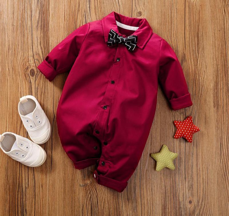 Stevvex baby boy romper with bow in burgundy red, front buttons, long sleeves on floor on Tampa Home & Garden Store