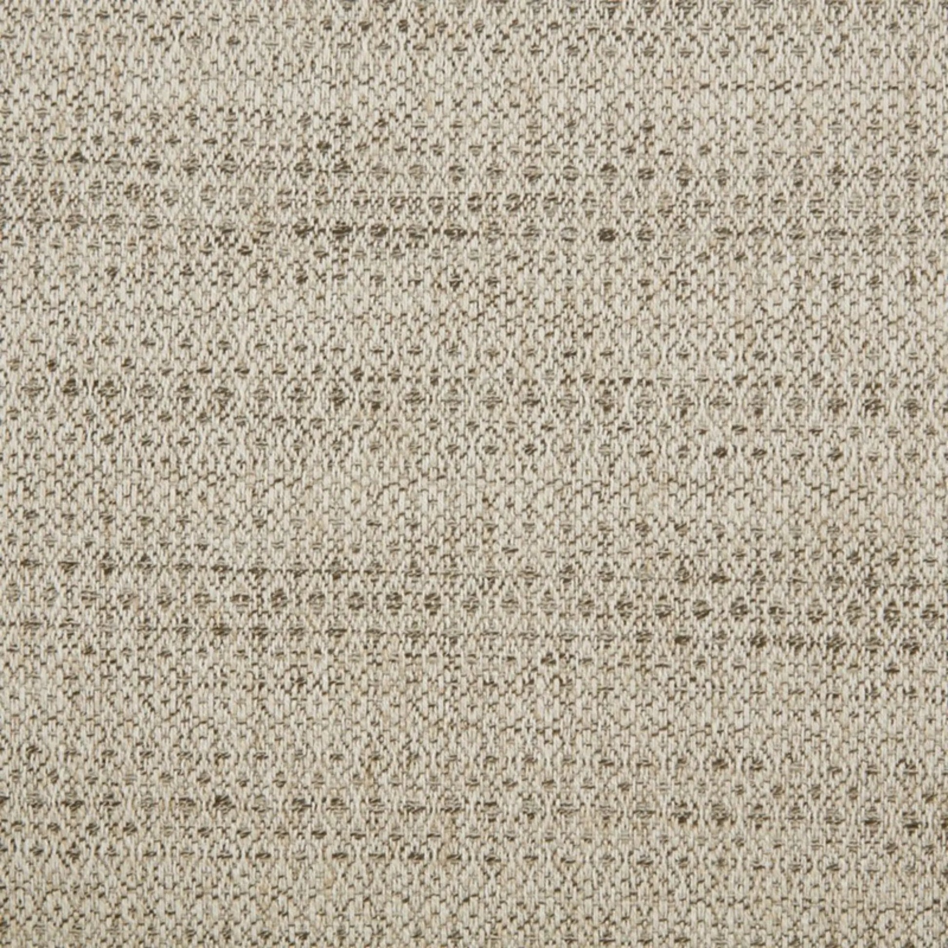 Beige textured carpet close-up with looped fibers in tan tones on Tampa Home & Garden Store