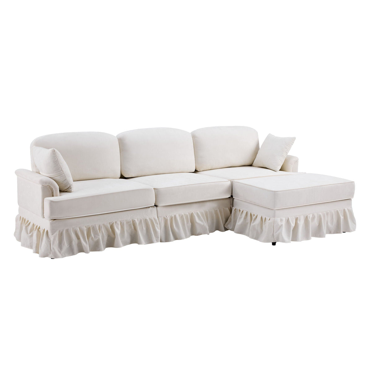 L-shaped sectional sofa in white fabric with removable ruffled skirt and ottoman on Tampa Home & Garden Store