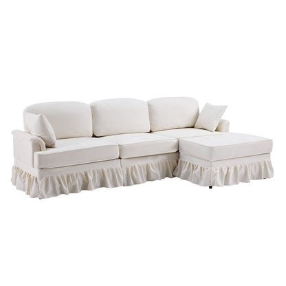 L-shaped sectional sofa in white fabric with removable ruffled skirt and ottoman on Tampa Home & Garden Store