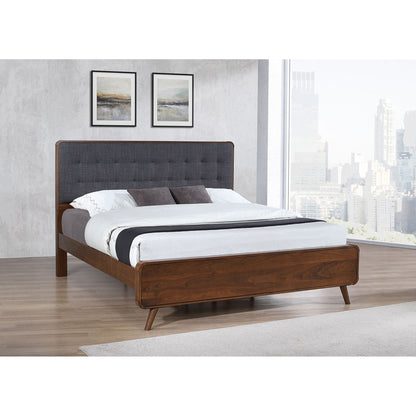 Carson Carrington platform bed with tufted dark gray fabric headboard and walnut wood frame on Tampa Home & Garden Store