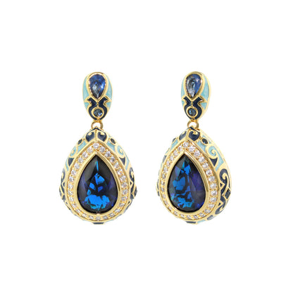 Elegant Drops Earrings by Lauren G Adams, gold-tone drops with blue teardrop crystals, pair on Tampa Home & Garden Store