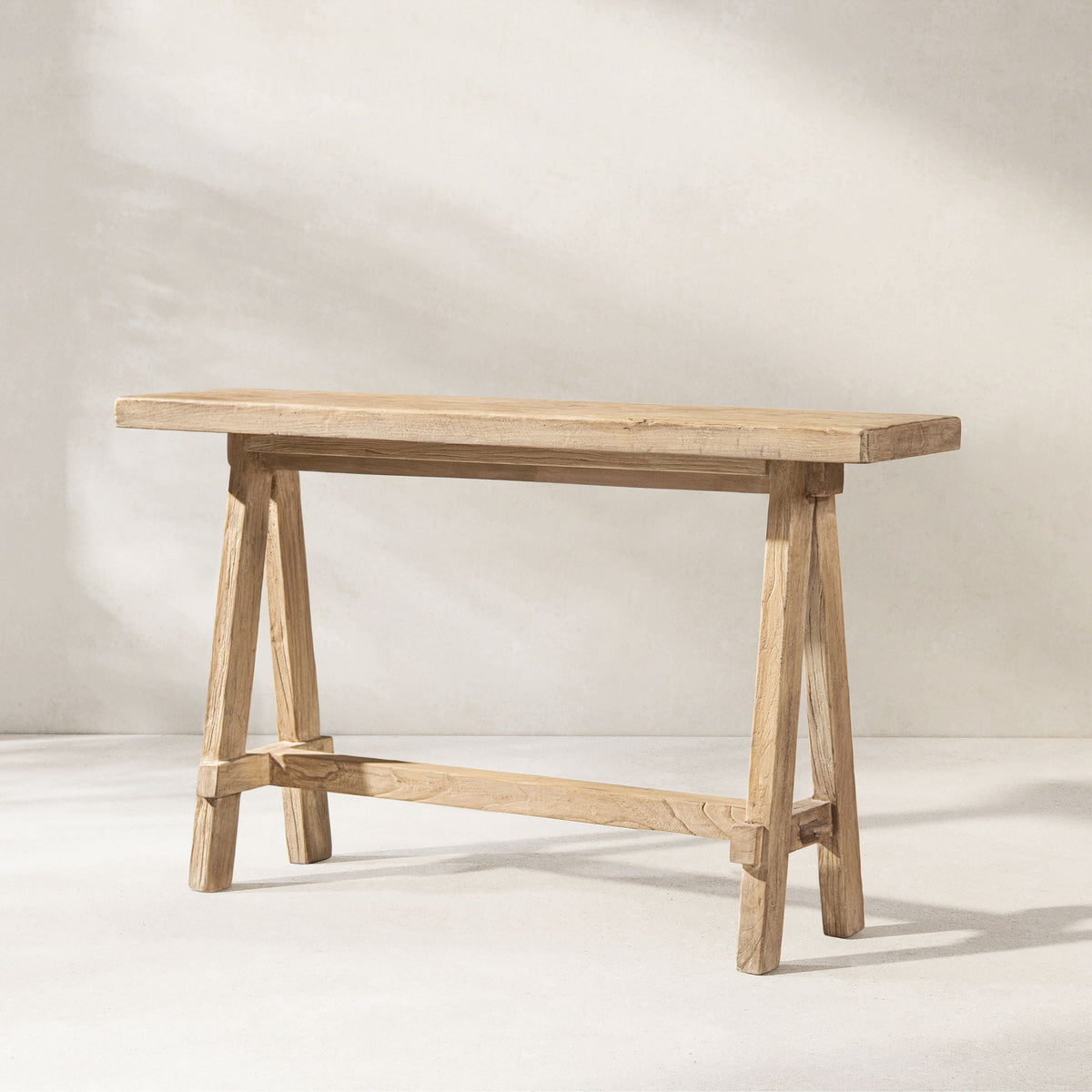 Trestle coffee table in light brown reclaimed elm with solid construction by HouseOfZazla on Tampa Home & Garden Store