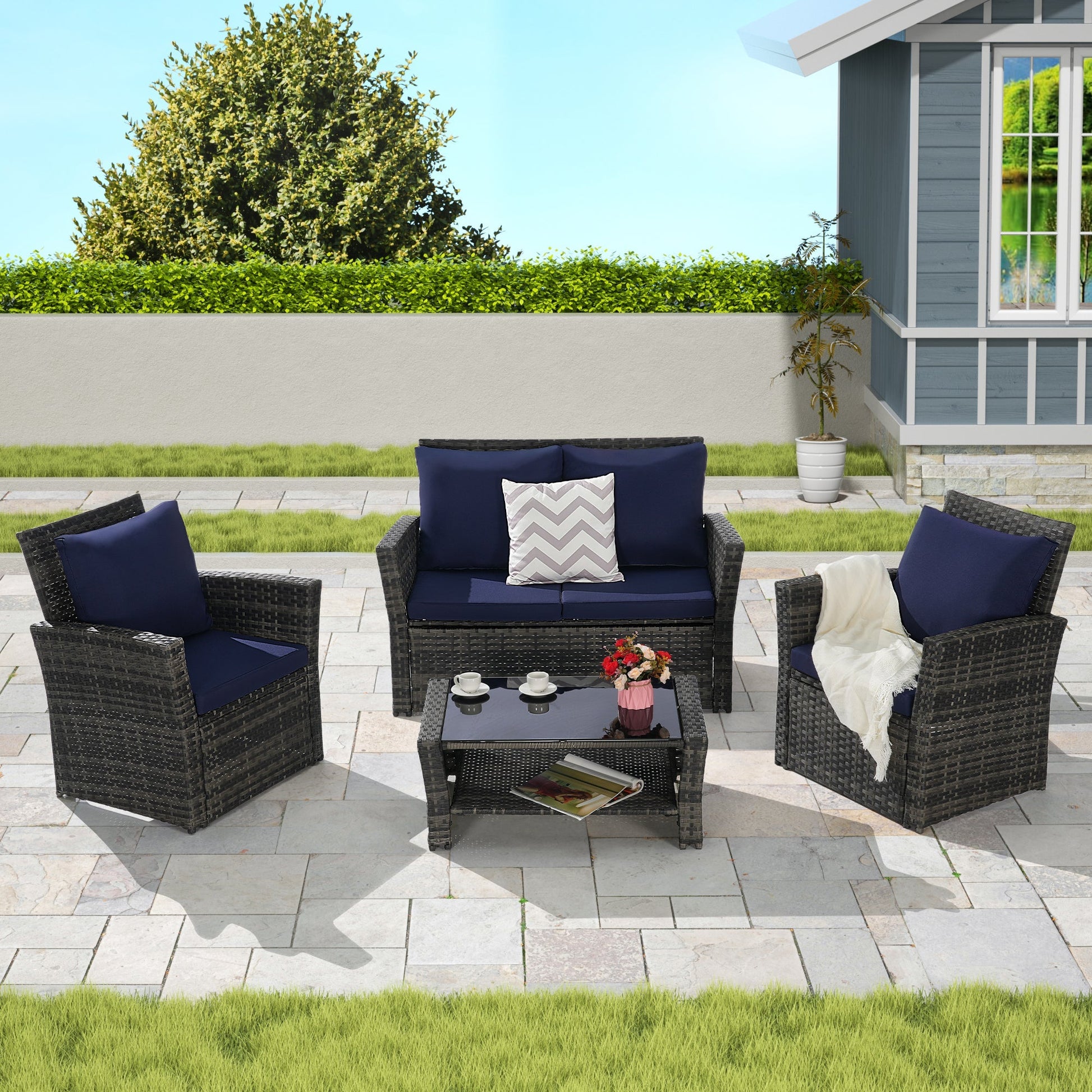 4-Piece HouseOfZazla rattan outdoor patio set with navy cushions and tempered glass table on Tampa Home & Garden Store