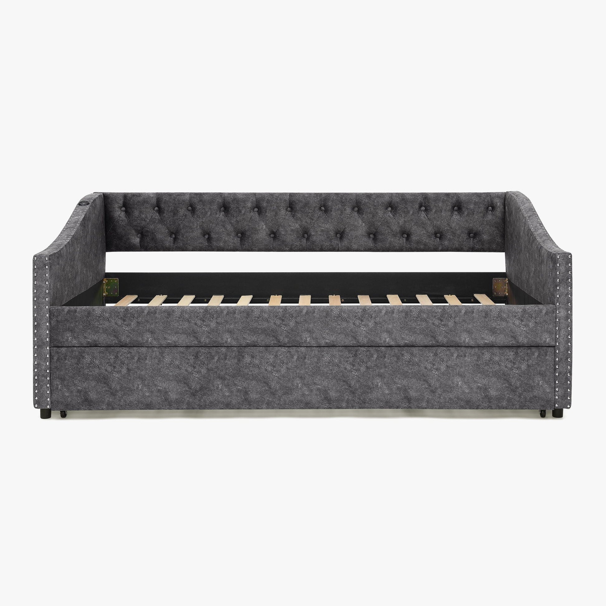 Upholstered gray daybed with tufted back and nailhead trim, pull-out trundle frame on Tampa Home & Garden Store