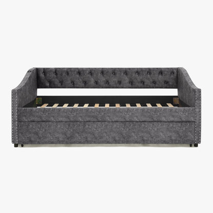 Upholstered gray daybed with tufted back and nailhead trim, pull-out trundle frame on Tampa Home & Garden Store