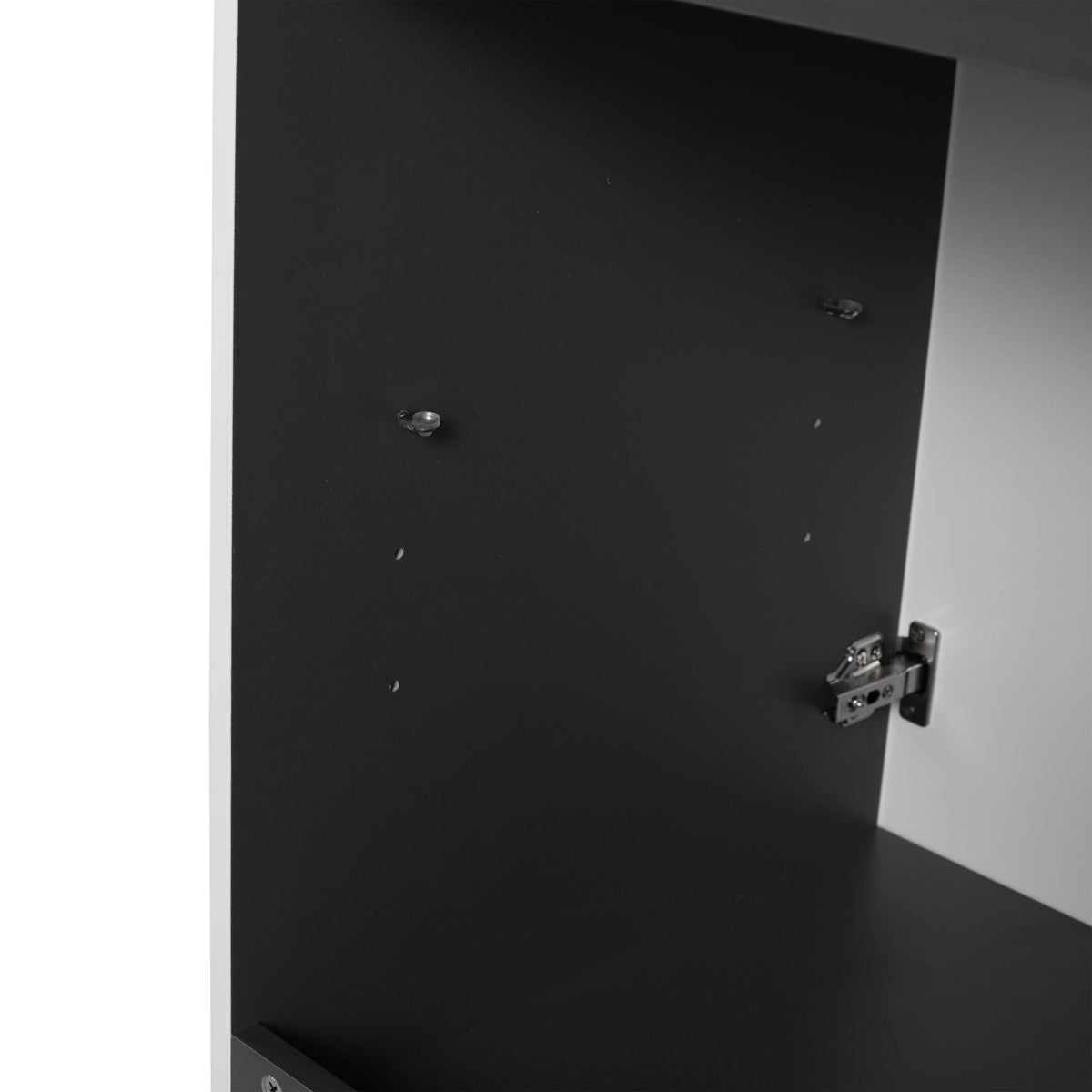 Freestanding bathroom vanity interior with black panels and exposed soft-close hinges on Tampa Home & Garden Store