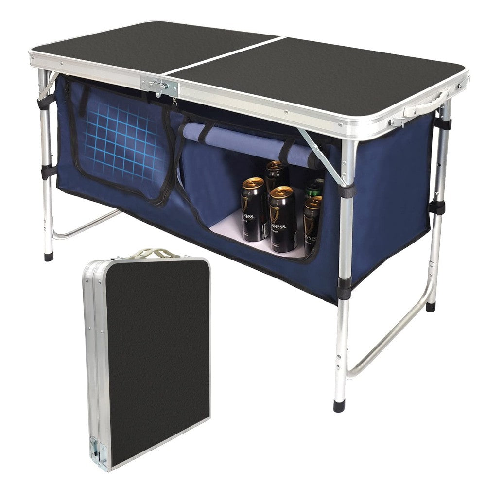 Folding camping table and storage compartment
