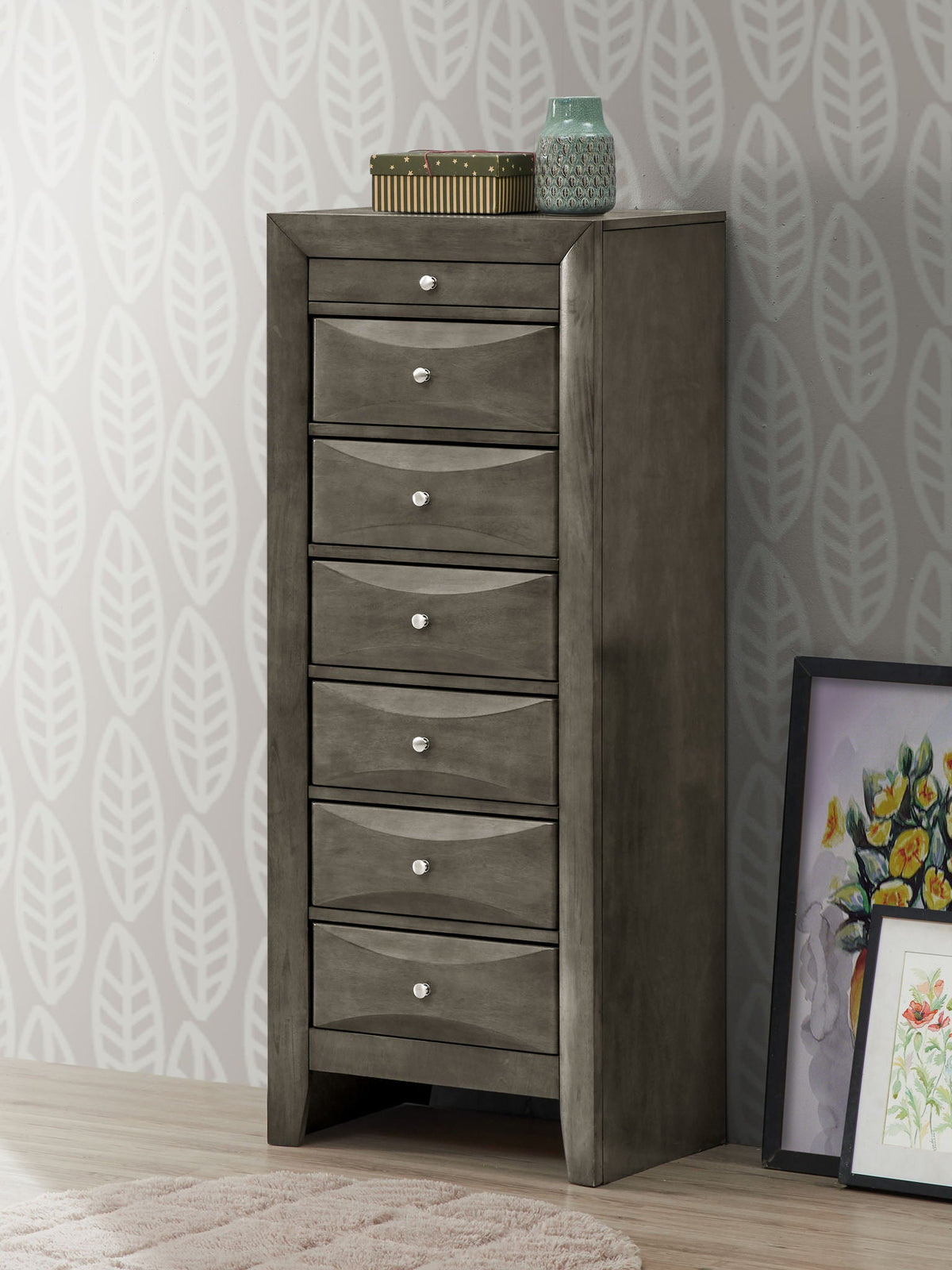 7-drawer lingerie chest in gray finish with knobs; top shows a star-patterned box and teal vase on Tampa Home & Garden Store