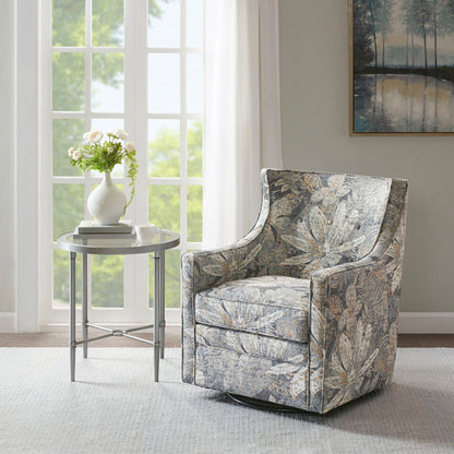 Swivel glider chair with multicolor upholstery and metal base beside a side table on Tampa Home & Garden Store