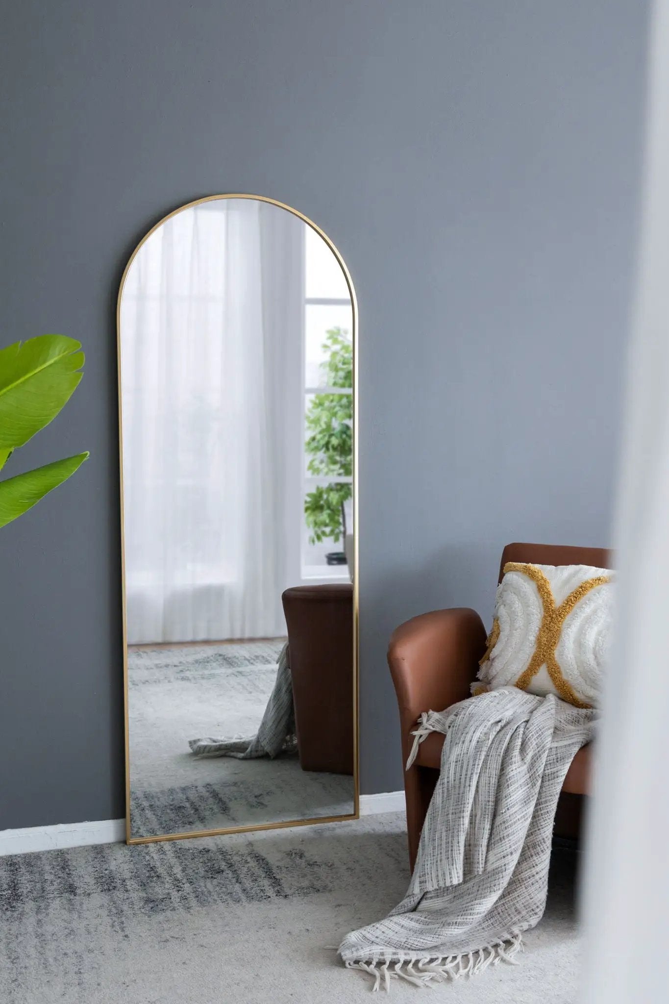 Celine Arch Body Mirror, a floor mirror with a slim gold frame by Unique Piece Furniture on Tampa Home & Garden Store