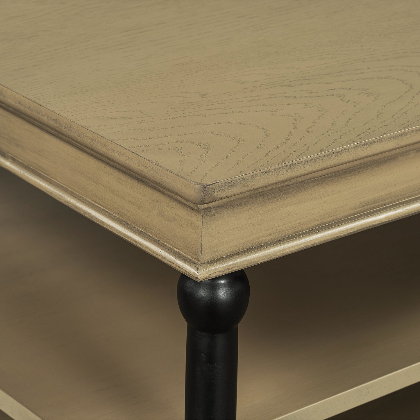 55.1' Wood coffee table with black legs; gold-tone surface and turned leg on Tampa Home & Garden Store