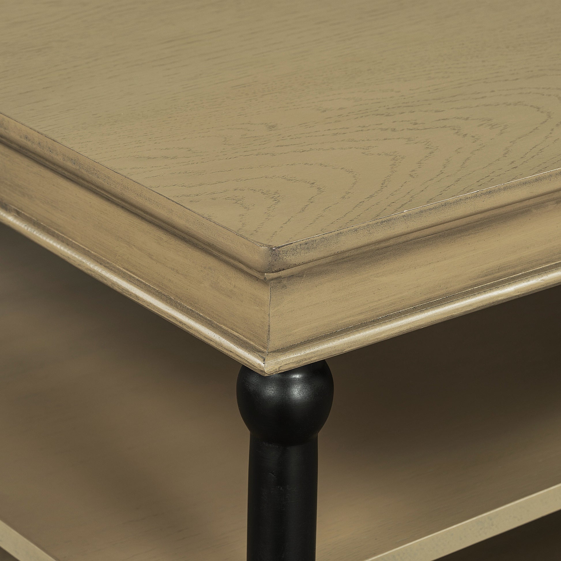 55.1' Wood coffee table with black legs; gold-tone surface and turned leg on Tampa Home & Garden Store