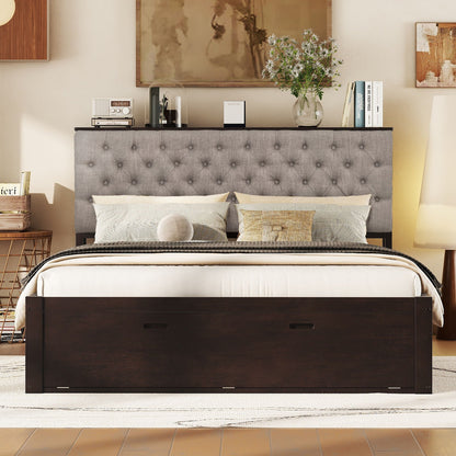 Platform bed with dark wood frame and tufted gray storage headboard plus four drawers on Tampa Home & Garden Store