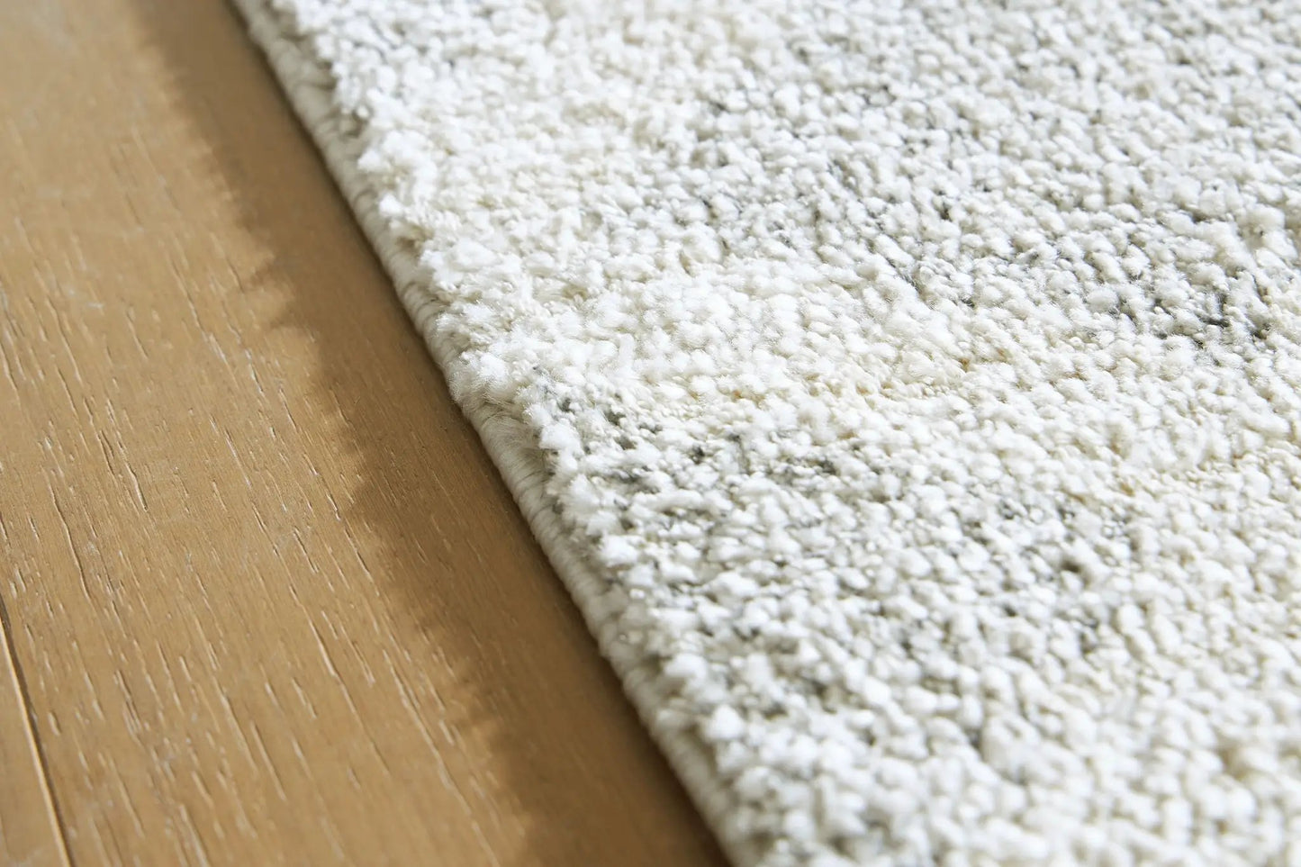 Unawick Rug cream shag area rug by Unique Piece Furniture on Tampa Home & Garden Store