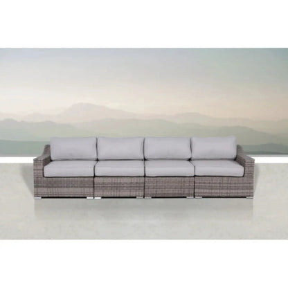 Contemporary outdoor stationary sectional in rattan wicker with light gray cushions on Tampa Home & Garden Store
